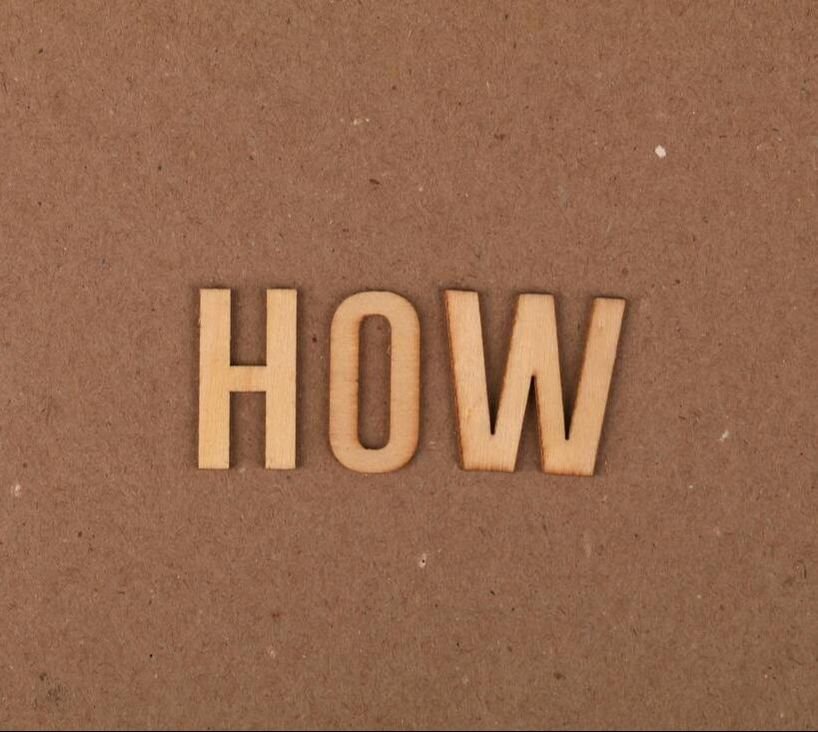 wood letters on a corkboard